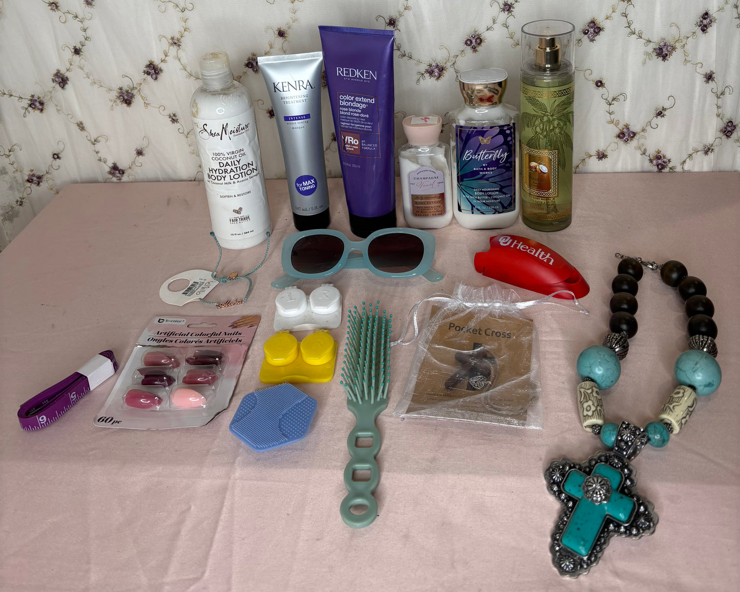 Necklace $5, Bath and Body Works spray & lotions $8 for all, Hair products and Shea Moisture lotion $3 each, pocket cross, hair brush, 2 set of contact cases, nails, bracelet, and pill cutter: $.50 each,